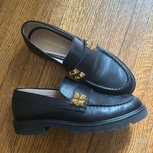 Stuart Weitzman black leather lug sole loafers